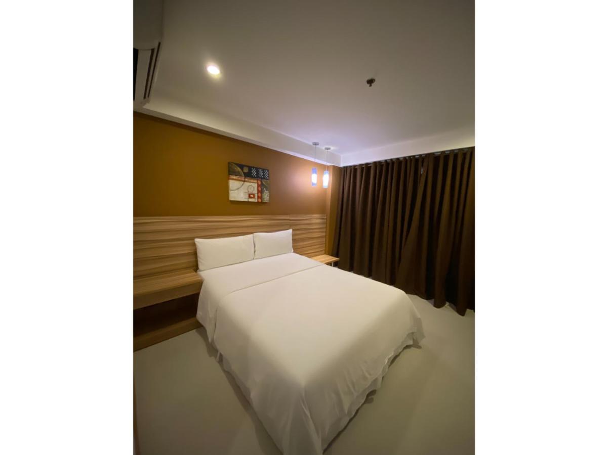Capital O 820 Guijo Suites Makati Manilla Buitenkant foto