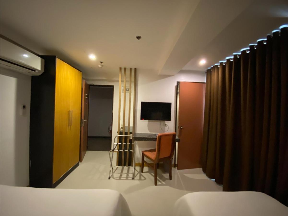 Capital O 820 Guijo Suites Makati Manilla Buitenkant foto