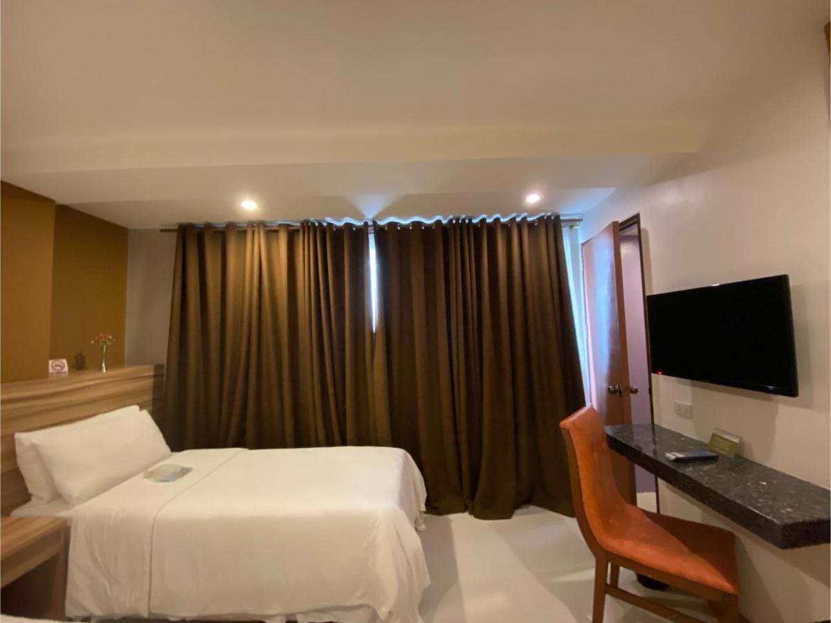 Capital O 820 Guijo Suites Makati Manilla Buitenkant foto